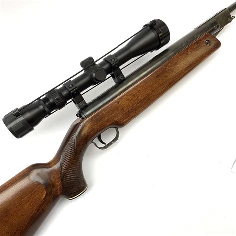 German Feinwerkbau Sport 124 .177 air rifle with break barrel action, chequered pistol grip and ...