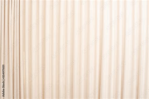 Cream-colored cloth, beige curtain fabric texture and background. Stock Photo | Adobe Stock