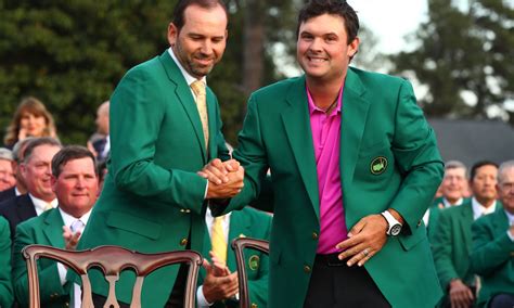 Apr 8, 2018; Augusta, GA, USA; 2017 winner Sergio Garcia greets 2018 winner Patrick Reed at the ...