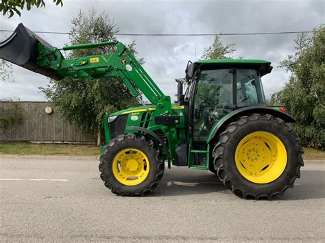 JOHN DEERE 5115M C/W JD H260 SELF LEVELLING FRONT LOADER & BUCKET - G.M ...