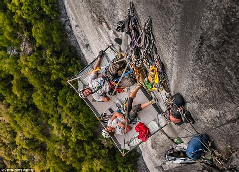 A REAL cliff hanger! Extreme campers pitch climbing tents more than 5 ...