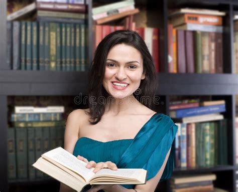 Portrait of Beauty Young Woman Reading Book in Library Stock Image ...