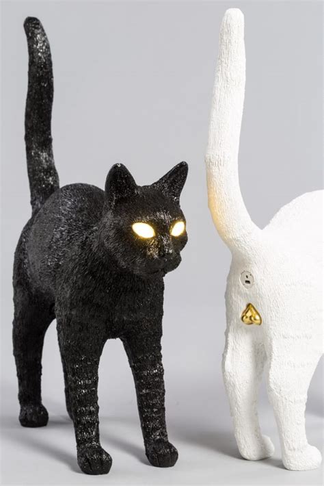 studio job's cat-shaped lamp for seletti has eyes that light up