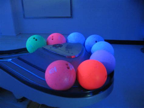 Neon-lit bowling balls | TfUnQ | Flickr