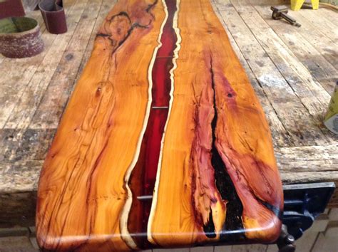 Live edge Yew. Coffee table top with Amber resin flowing through the ...