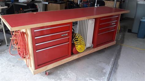 Rolling work bench made to incorporate tool chest with open clamp and ...