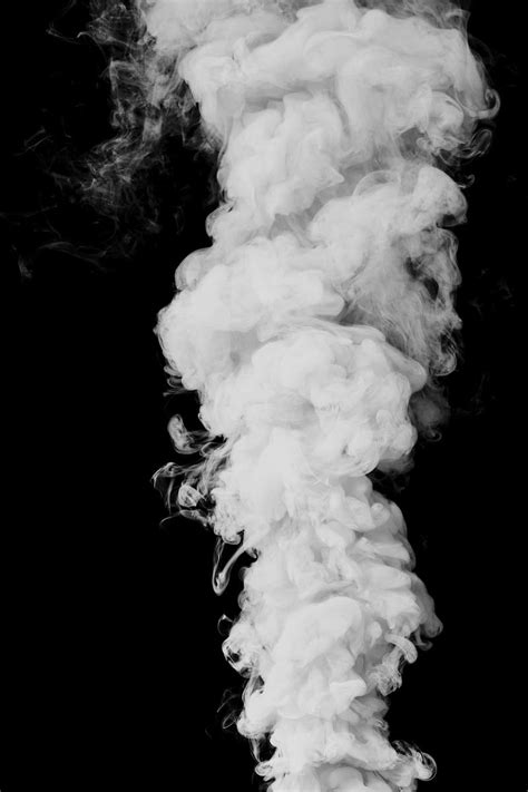 White smoke effect design element on a black background