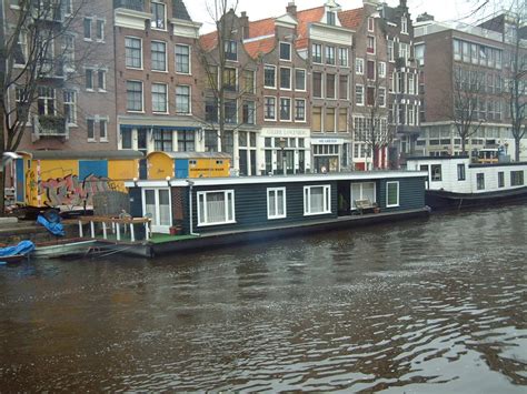 Houseboats in Amsterdam. | House boat, Travel, Canal