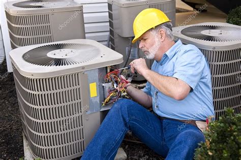 Air Conditioning Repairman At Work — Stock Photo © whitestar1955 #55686505