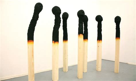 The REAL matchstick men: Artist puts charred human faces on the end of ...