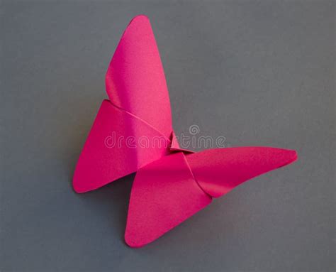 Pink Paper Butterfly Origami Isolated on a Grey Background Stock Image ...