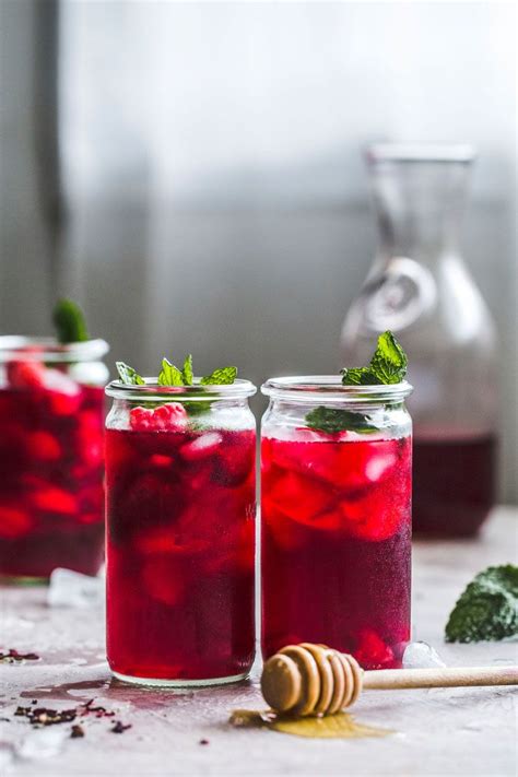 Raspberry Hibiscus Iced Tea with mint and honey | thealmondeater.com | Fruit tea recipes, Iced ...