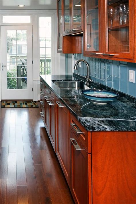 Alaskan Blue Granite Countertops Dark Hardwood Floor Cherry Cabinet ...