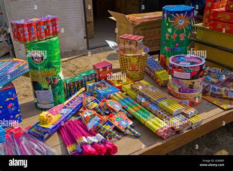 Fireworks on sale on a stall in the street in Beijing during Chinese New Year celebrations ...