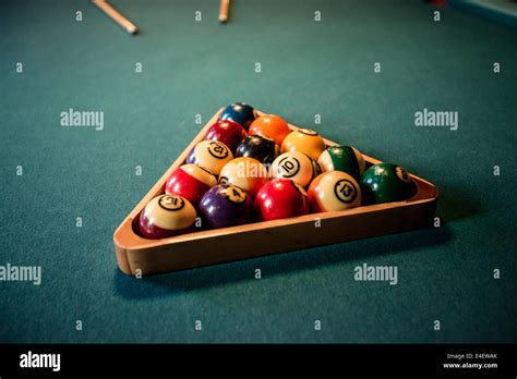 Pool table and balls Stock Photo - Alamy