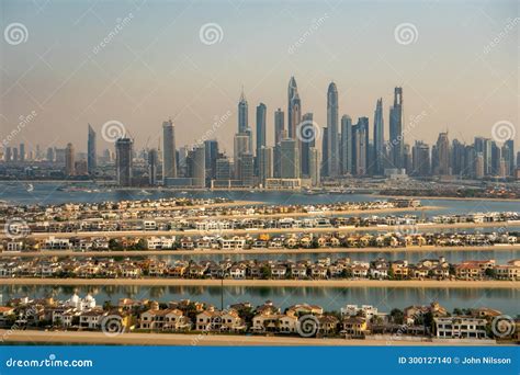 Aerial View of the Luxury Villas of the Palm Island and of the Skyline of Dubai Marina, UAE ...