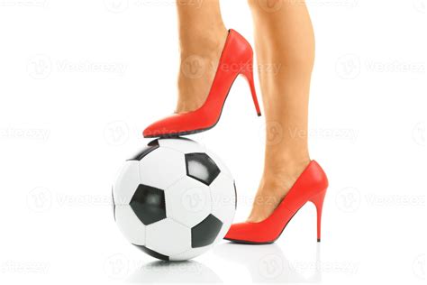 Red heels and football 15894991 Stock Photo at Vecteezy