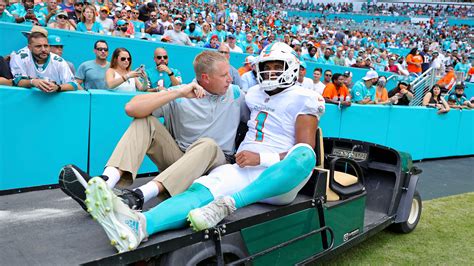 Dolphins' Tua Tagovailoa carted off the field with rib injury after ...