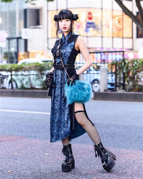 Tokyo Fashion: Harajuku shop staffer Misuru (@meguharajuku) on the street wearing a twin buns h ...