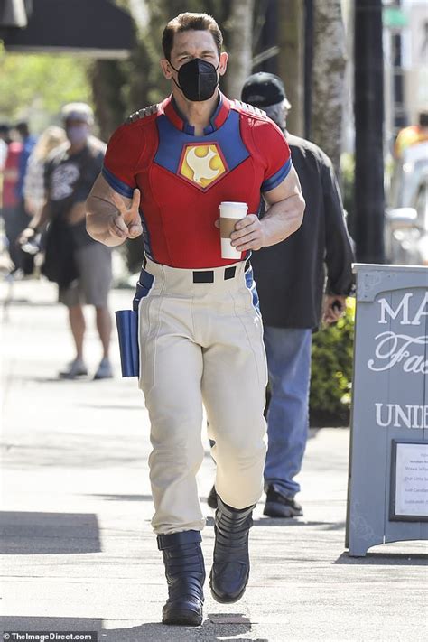 John Cena flashes a peace sign in costume as DC character The Peacemaker on Vancouver set - DUK News