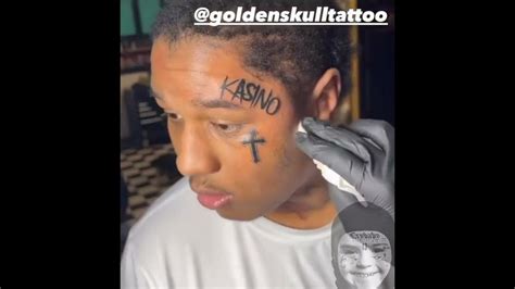 Ebk jaaybo gets a new Face Tattoo - YouTube