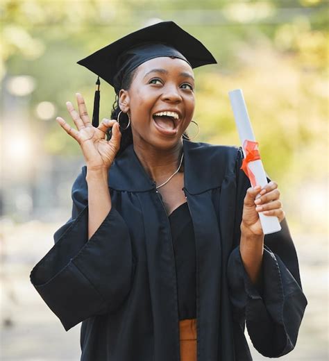 Premium Photo | Graduate scroll happy black woman and okay sign for learning success education ...