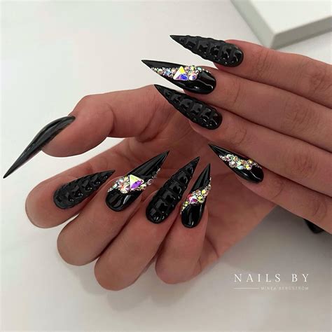 Matte Black Stiletto Nails