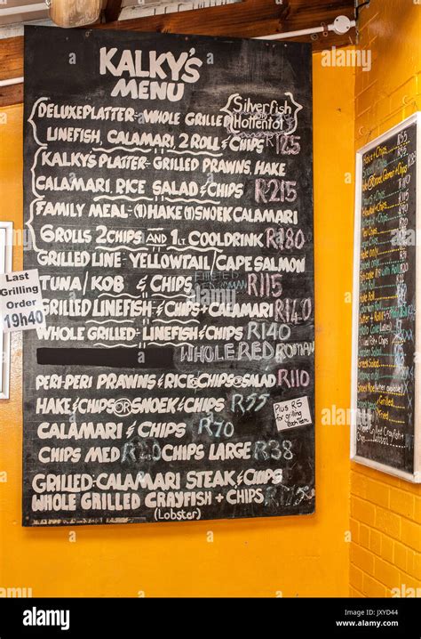 Menu of Kalky's fish and chips restaurant in Kalk Bay, Cape Town Stock Photo - Alamy