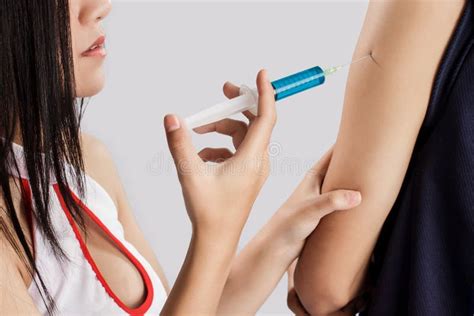 Injection in arm stock image. Image of hold, doctor, patient - 46786913