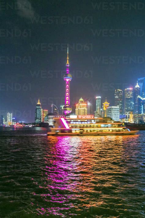 China, Shanghai, illuminated skyline of Pudong at night stock photo