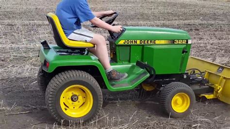 John Deere 322 Garden Tractor with 4-way Blade - YouTube