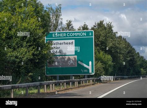 Partially obsured route signs on the A3 dual carriageway in Surrey ...