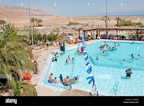 Israel, Dead Sea, Ein Gedi Resort and Spa. Holidaymakers in the thermal ...