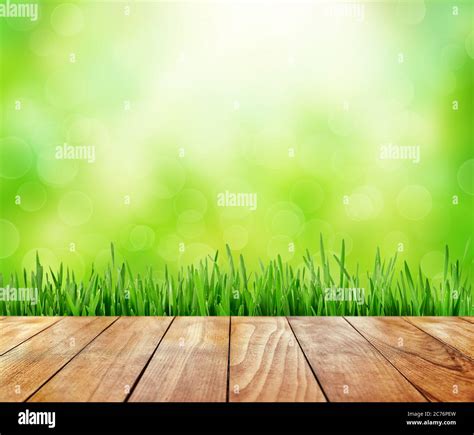 Wooden deck table on green background hi-res stock photography and images - Alamy