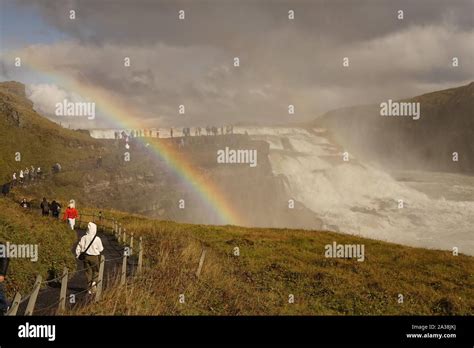 A rainbow across Gullfoss waterfall in Iceland Stock Photo - Alamy