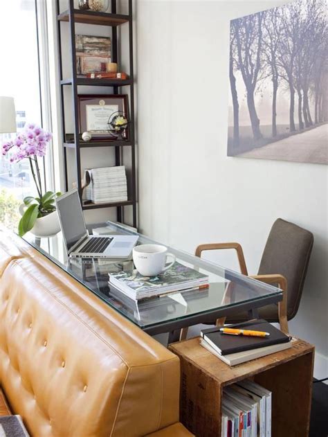 A small home office can share space with your living room - try putting your desk behind the ...