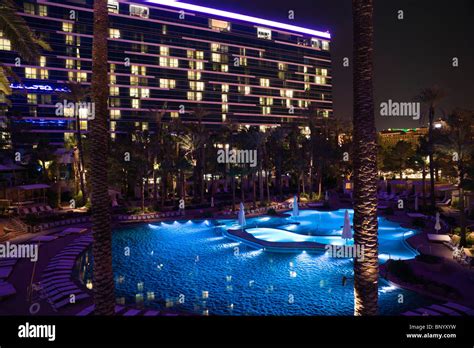 Hard Rock Hotel, Las Vegas USA - the swimming pool floodlit at night Stock Photo - Alamy