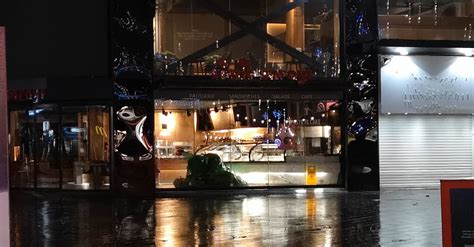 An Empty Restaurant With Christmas Decorations After A Rainy Night Free ...