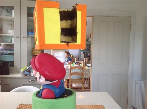 Super Mario block busting cake. - Cake by AmyLea - CakesDecor