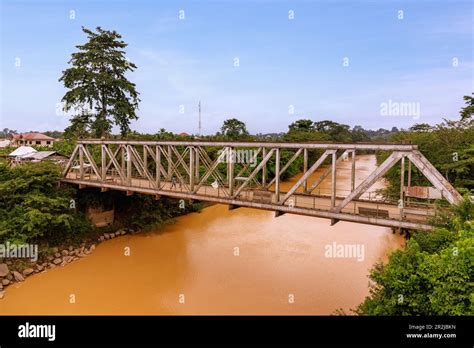 River Pra and Old Bridge in Assin Praso in the Central Region of southern Ghana in West Africa ...