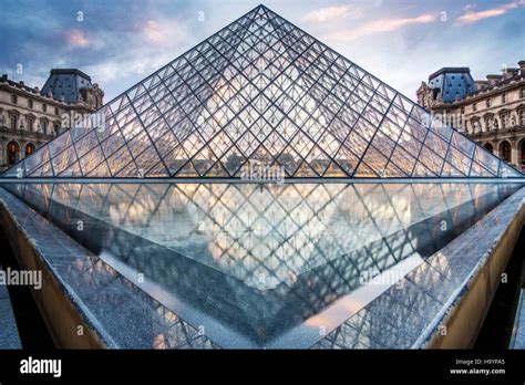 The glass pyramid entrance to the Louvre, designed by architect I.M.Pei ...