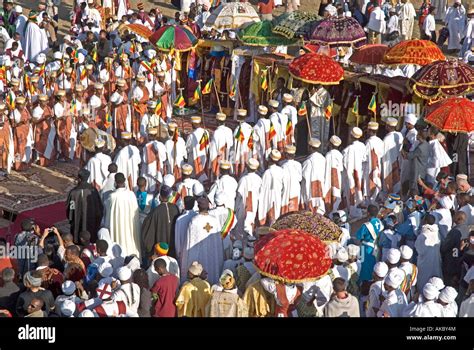 Debterras (Choir members) of the Ethiopian Orthodox Church perform sacred dance at 'Timkat ...