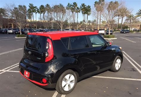 Super Rare Cherry Black / Inferno Red Kia Soul EV With White Alloys | Kia News Blog