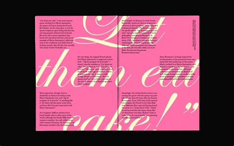 an open book with pink and gold lettering