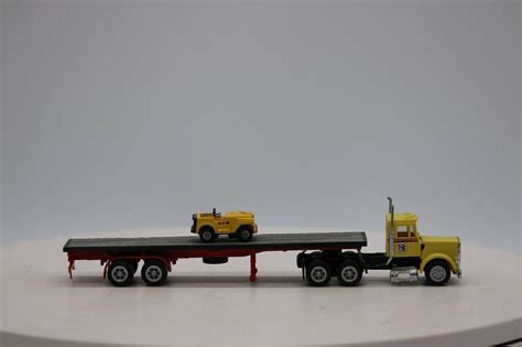 HO SCALE Ryder Semi Truck w/ Flatbed Trailer with DPW Jeep Load | #4549746170