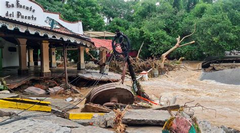 Nora, now tropical storm, kills boy in Mexican resort town | Reuters