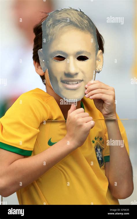 A Brazil fan wearing a Neymar mask inside the Estadio Mineirao before the FIFA World Cup Semi ...