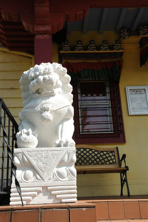 Papa stone lion with ball, on front porch, Sakya Monastery… | Flickr