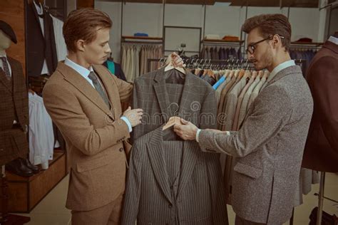 Men choose a suit stock image. Image of male, luxury - 235452745