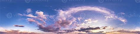 Seamless hdri panorama 360 degrees angle view blue pink evening sky with beautiful clouds before ...
